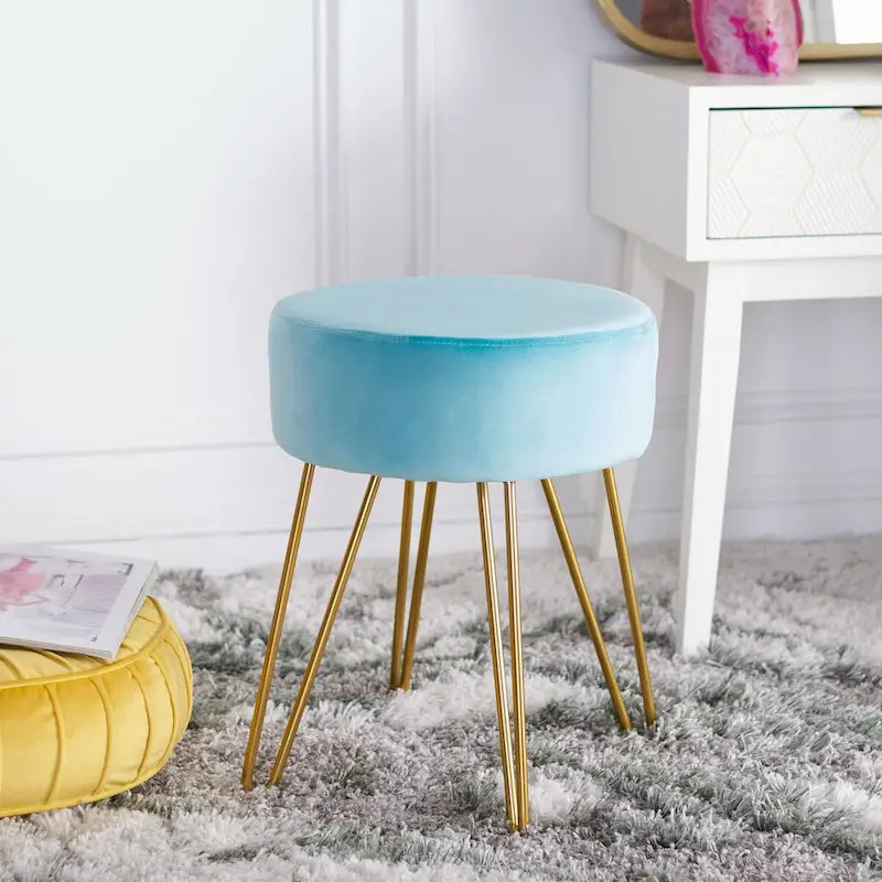Pouf Jailene con gambe a forcina
